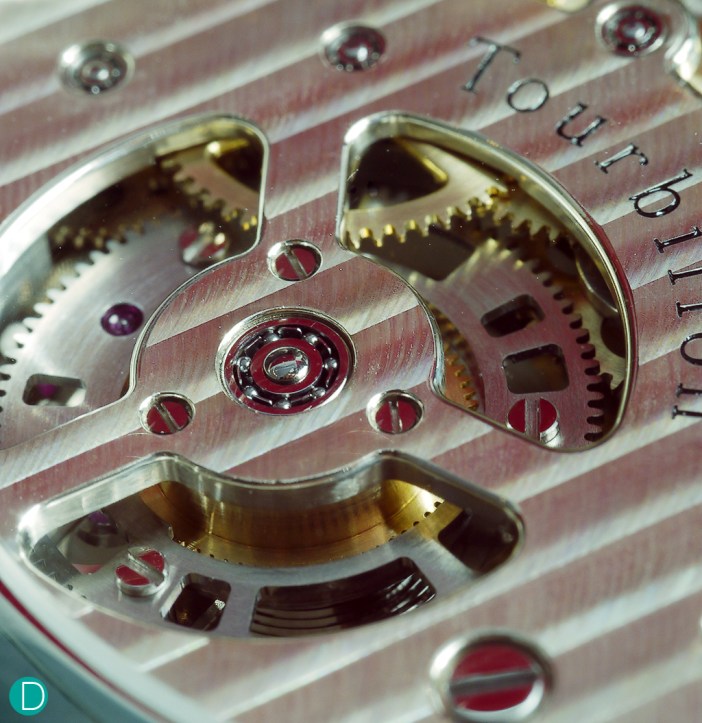 The tourbillon bridge from the back, showing the ball bearing pivots, and nicely finished arms to support the ball bearing assembly.